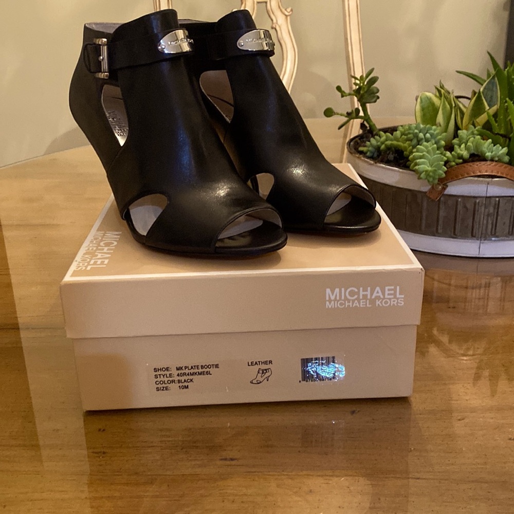 Michael Michael Kors, black leather open toe bootie.